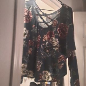 Dress shirt has an open back and can tye in the front this is BRAND NEW W/O tag